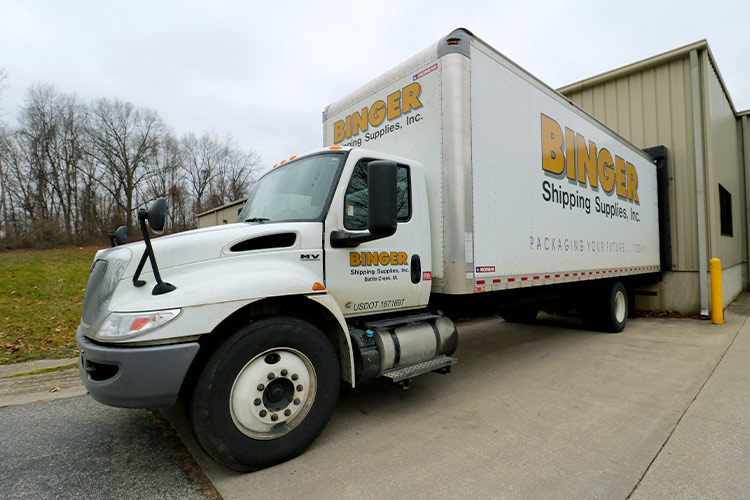 Binger Shipping Truck Outside of Warehouse